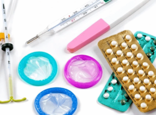 Various contraceptive methods including birth control pills, condoms, IUDs, and pregnancy test illustrating what to expect when stopping birth control.