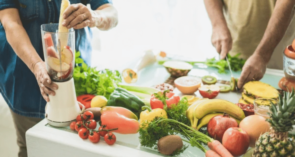 People preparing healthy foods for anti-ageing nutrition with fresh fruits and vegetables to support biological age