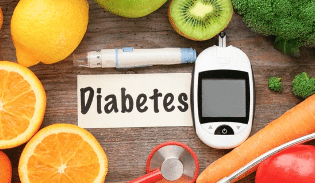 Diabetes management concept with blood glucose meter, healthy foods, and stethoscope showing foods that affect blood sugar levels