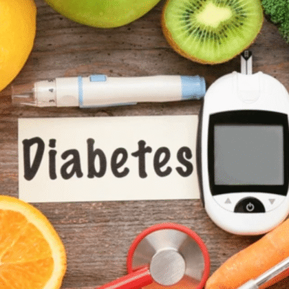 Diabetes management concept with blood glucose meter, healthy foods, and stethoscope showing foods that affect blood sugar levels